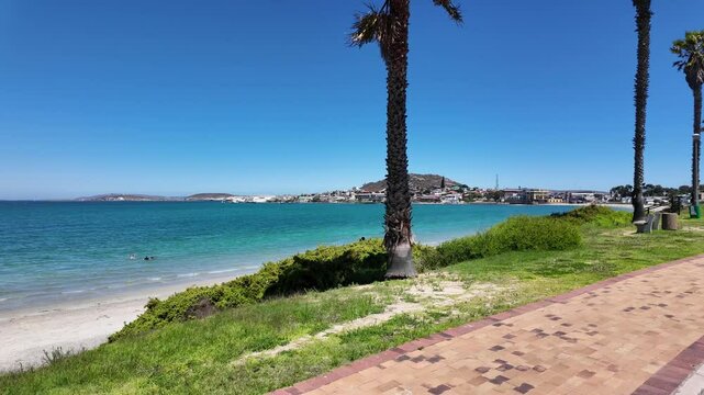 Saldanha Bay, Western Cape South Africa. 27.03.2024. Video. Grass promenade alongside the beach in Saldanha Bay on the west coast South Africa