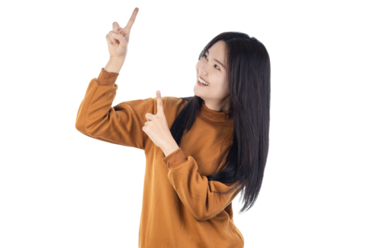 Young Asian woman use finger pointing to side with product or empty copy space standing isolated on white background with clipping path. Advertisement presenting concept