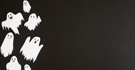 close up group cute of poltergeist ghosts flying together with feeling funny on black color background and space for decoration halloween trick or treat design concept