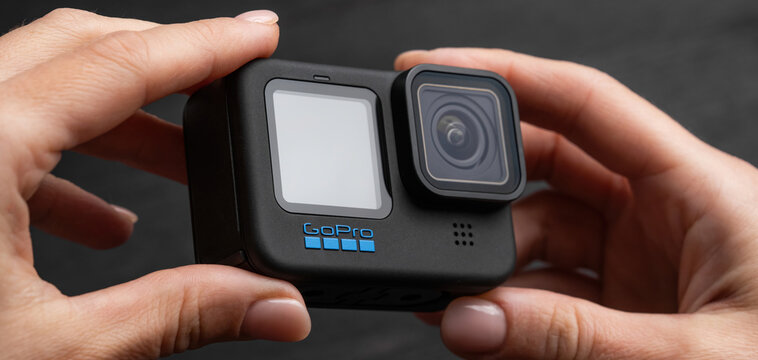 Poznan, Poland - 30 November 2022: Action camera GoPro hero 11 in girls hands