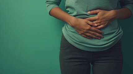 Understanding Stomach Ache: Causes, Symptoms, and Management | Illustration of Abdominal Pain from Indigestion on Green Background
