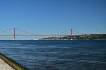 Suspension bridge crossing the river Tagus in Lisbon Portugal. The 25 de Abril Bridge. 