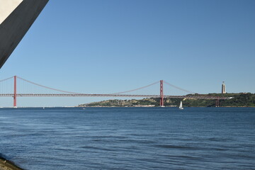 Suspension bridge crossing the river Tagus in Lisbon Portugal. The 25 de Abril Bridge. 