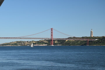 Suspension bridge crossing the river Tagus in Lisbon Portugal. The 25 de Abril Bridge. 