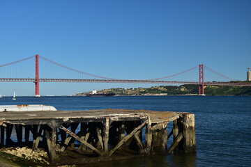 Suspension bridge crossing the river Tagus in Lisbon Portugal. The 25 de Abril Bridge. 