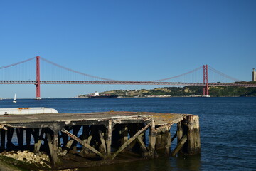 Suspension bridge crossing the river Tagus in Lisbon Portugal. The 25 de Abril Bridge. 