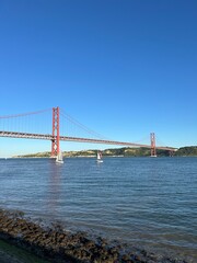 Suspension bridge crossing the river Tagus in Lisbon Portugal. The 25 de Abril Bridge. 