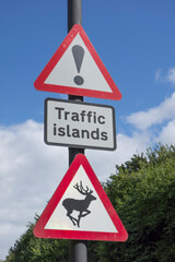Warning (danger) signs for traffic islands and wild animals or deer