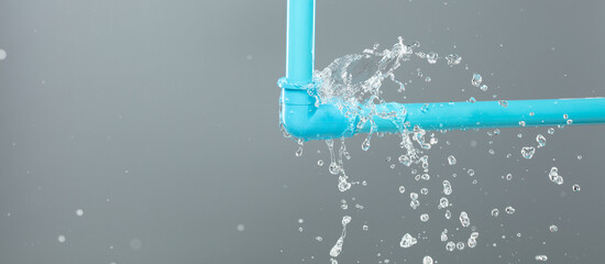 Leaking water from blue pvc plastic pipe under sink. Drain leak water from blue pvc plastic pipe...