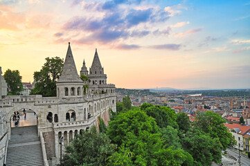Fototapeta premium Fisherman's Bastion panoramic view with town from the hillside in sunset,Budapest