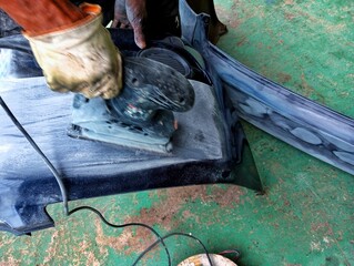 sanding the car dashboard