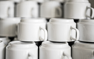 Lots of empty tea or coffee mugs.