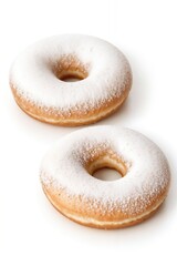 donuts sprinkled of sugar powder on white background