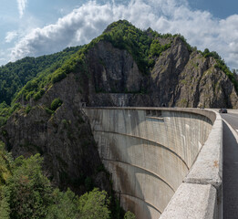 Crossing the impressive Vidraru Dam along the Transfăgărășan road (DN7C) in the Fagaras mountains, Transylvania, Romania