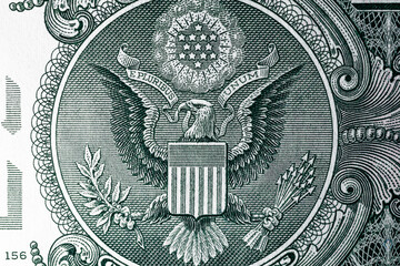 Eagle on the back of the dollar bill. United States national currency banknote fragment