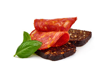 Spanish pork chorizo sausage slices, close-up, isolated on white background.