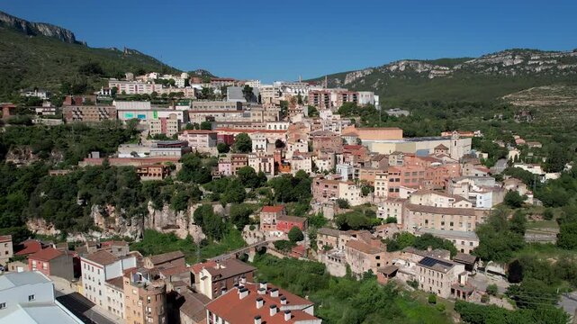 Rising up aerial footage of La Riba town on sunny summer day. Tarragona, Spain.
