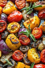 Fototapeta premium Colorful roasted vegetables arranged beautifully, showcasing vibrant tomatoes, yellow peppers, and fresh herbs for a delicious meal.