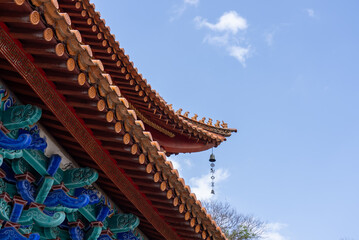 Clos up View of Chinese Roof from Outside at Daytime with Blue Sky