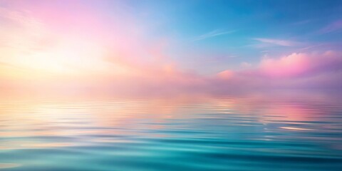Fototapeta premium Soft dreamy pastel colors blending in water creating a beautiful abstract background