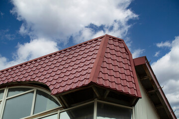 Metal tile.Roof for the house. Modern coatings for the roof of the house.