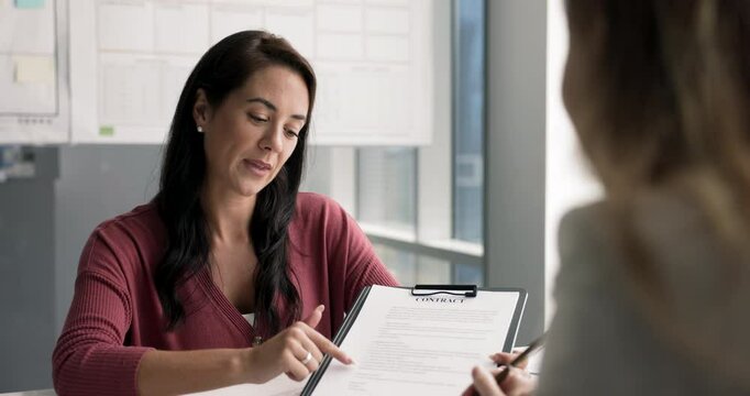 Young 35s Hispanic sales manager, bank advisor, company representative met in office with customer, explains contract details, provide information about terms and conditions at negotiations to client