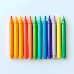 Vibrant rainbow colored set of art markers arranged in the center of a plain white background highlighting the colorful nature of the office supplies