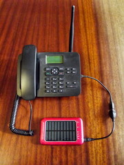 After the end of the working day, I put the office phone on charge from a solar power bank