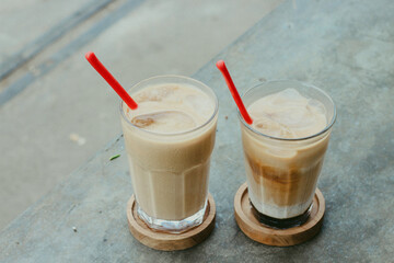 Iced coffee milk with palm sugar on a table. Iced coffee with palm sugar is popular in various cafes