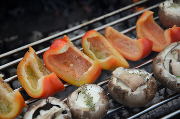 Veggie grill: vegetables on barbecue. Summer outdoor food preparation.