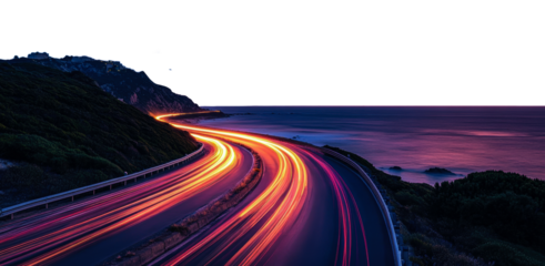 Winding coastal road with light trails at dusk, cut out - stock png.