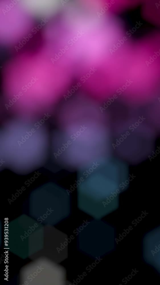 Poster abstract background of moving bokeh on black background. animation. blurred round particles move in 