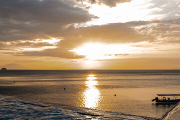 PG Island, Oriental Mindoro Province, Philippines - Silhouette of people on the beach at sunset
