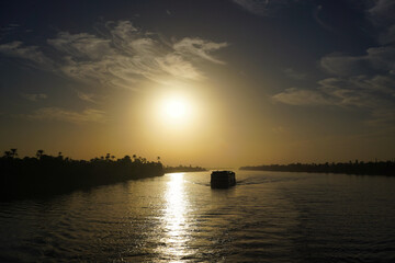 Cruise ship at the Nile river during sunset, Luxor, Egypt
