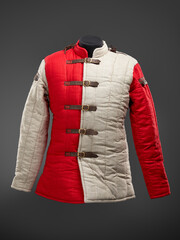 Historical fashion. Medieval knight cloth. Padded jacket gambeson.