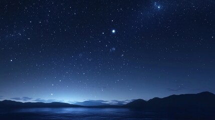 A serene night sky filled with stars over a calm ocean and distant mountains.