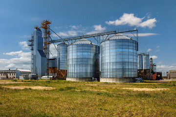 granary elevator with silos on agro-processing and manufacturing plant for processing drying cleaning and storage of agricultural products, flour, cereals and grain.