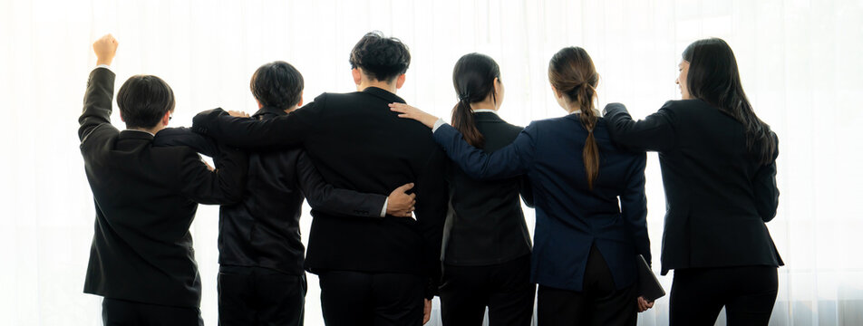 Panoramic banner back view of office worker team standing in line together with friendship posture symbolize successful professional teamwork and job employment, HR agency recruitment concept. Shrewd