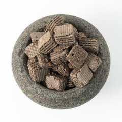 Biscuits chocolate with crumbs on white background. It is a chocolate cookies with a sweet cream.