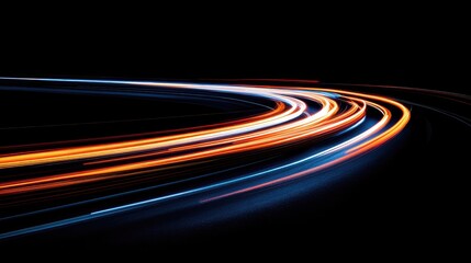 Curved light trails creating a smooth, winding pattern on a black background, evoking the image of a road in motion.