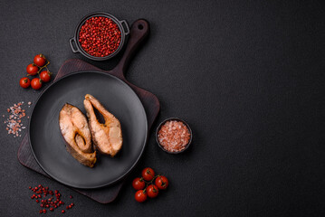 Delicious red salmon r trout fish grilled with spices and herbs