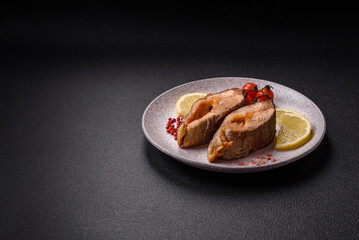 Delicious red salmon r trout fish grilled with spices and herbs
