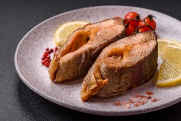 Delicious red salmon r trout fish grilled with spices and herbs