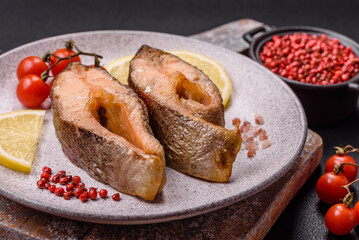 Delicious red salmon r trout fish grilled with spices and herbs