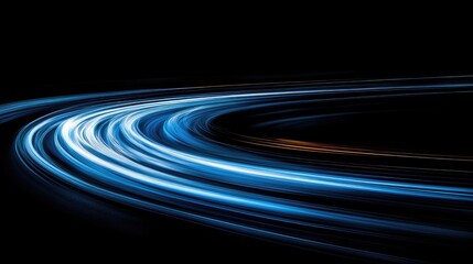 Abstract light trails resembling a curved road, winding across a dark background, creating a sense of movement.