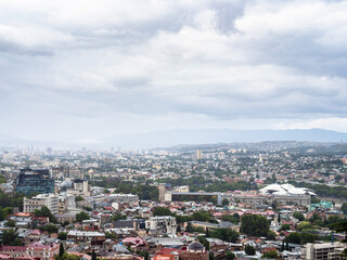 gray rainy clouds over Tbilisi city on summer rain