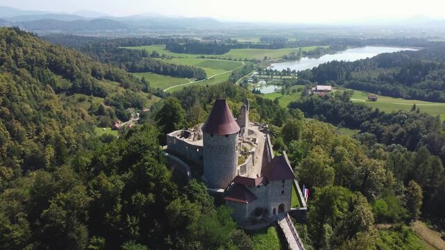 Aerial drone shot of medievel castle Žovnek located in Braslovče, Slovenia