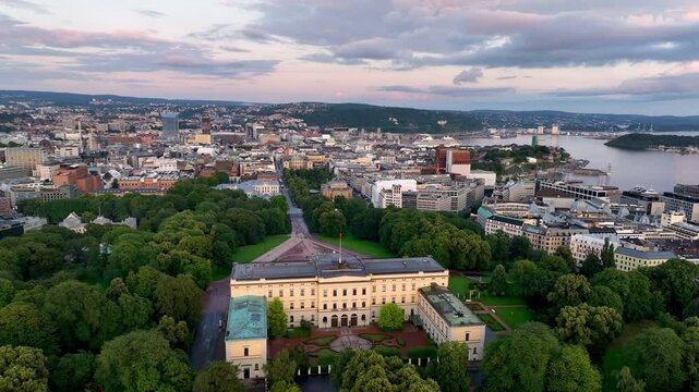 4K aerial video of the Royal Palace (Det kongelige slott) and Statue of King Karl Johan Oslo. In the background the castle park. Oslo, Norway.