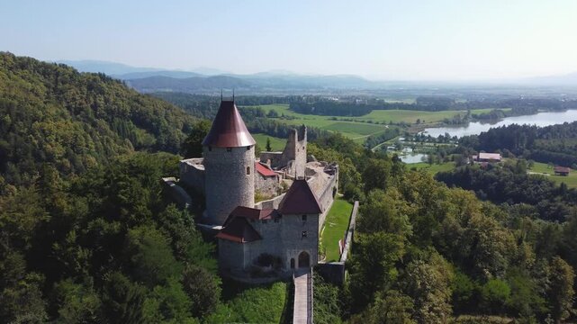 Aerial drone shot of medievel castle Žovnek located in Braslovče, Slovenia