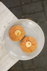 Choux au Craquelin french pastry or cream puff dessert on a plate